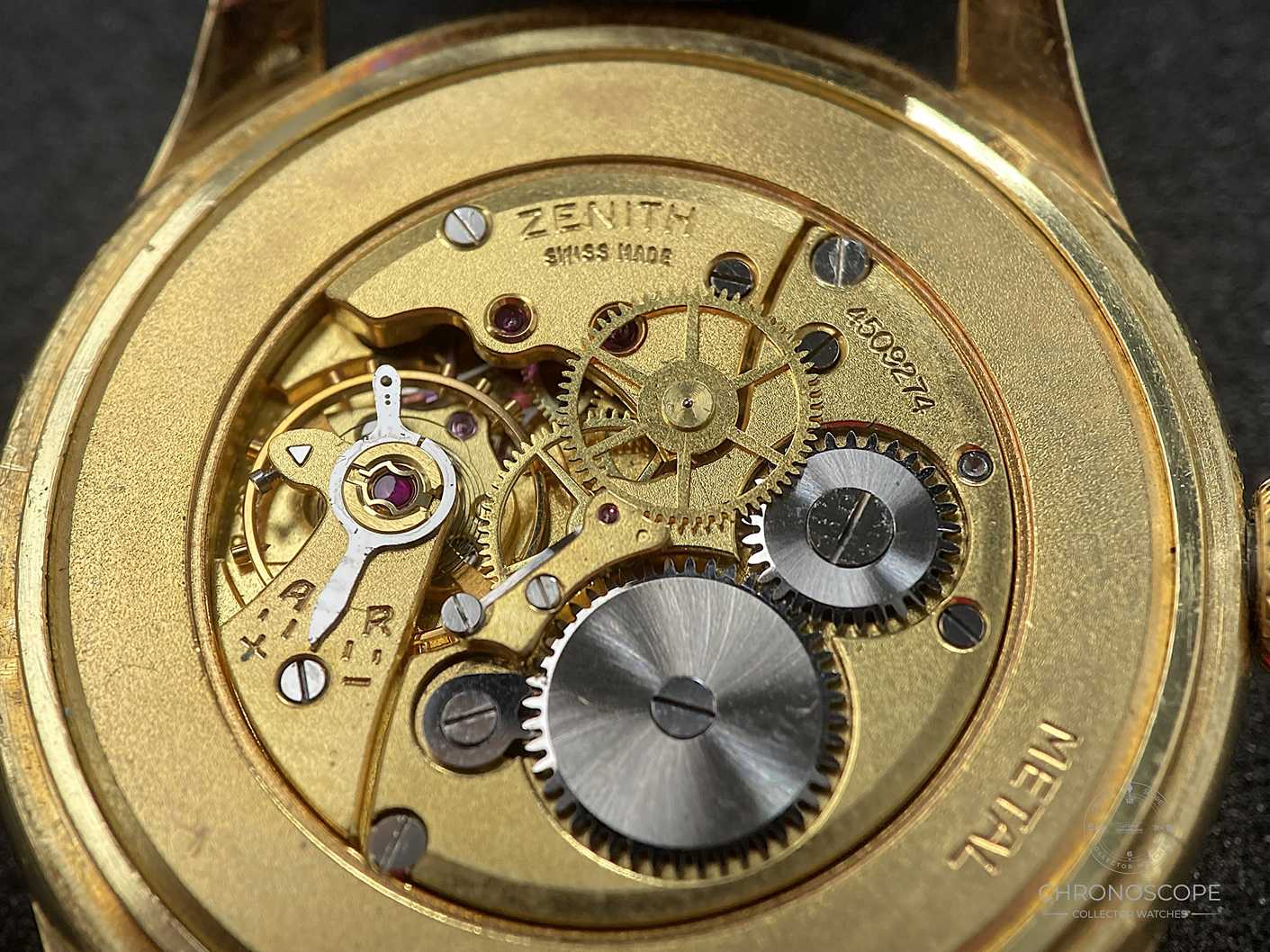 Alt: Zenith vintage 18k gold dress watch from 1956