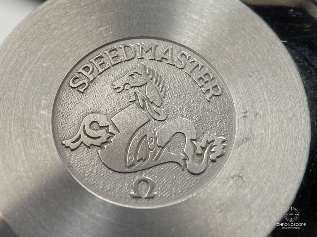 Close-up of an Omega Speedmaster caseback engraving